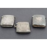 Three silver vesta cases, each profusely foliate engraved, 51.6g