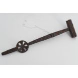 A 17th Century wheel-lock pistol or musket spanner, 20 cm