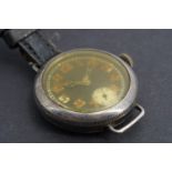A Great War Rolex silver trench watch, having a 17-jewel movement and black enameled face with white