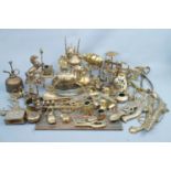 A quantity of brass ware including a bronzed Last Supper plaque, brass animals etc.
