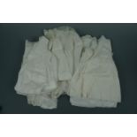 A number of antique lace-trimmed cotton Christening gowns