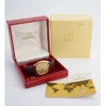 A 1970s Omega De Ville quartz gold-plated wrist watch, boxed with papers