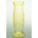 A late 19th / early 20th Century yellow-flashed and wheel-cut glass vase, of slender, bellied form