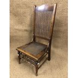 A Victorian cane backed nursing chair