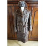 A 1940s mink fur coat retailed by E Taylor and Son of Glasgow, and a matching unnamed hat