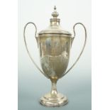[ Equestrian / Sporting ] A George V silver trophy cup and cover, of elongated ovoid form, with