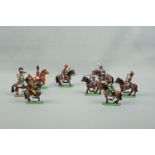 Twelve hand-painted die-cast model Napoleonic cavalry figures, approx 11 cm high