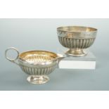 A Victorian silver dainty sugar bowl and cream jug, of hemispherical section, with half gadrooned