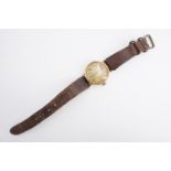 A 1920s Unicorn 9 ct gold wrist watch, having a 15 jewel manual movement, the circular frosted