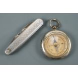 An early 20th Century German pocket magnetic compass together with a folding knife, compass 3.5 cm