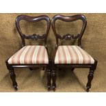 A pair of early Victorian mahogany dining chairs