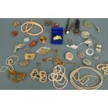 A quantity of vintage costume jewellery and watches including a Victorian white metal lozenge-shaped