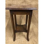 A small George V oak plant stand, 48 cm