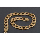 A yellow metal faceted curb link bracelet, 22 cm, 12.8 g