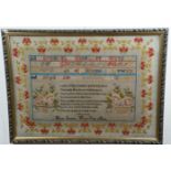 A large Victorian needlework sampler, comprising the alphabet and numbers, with a religious verse