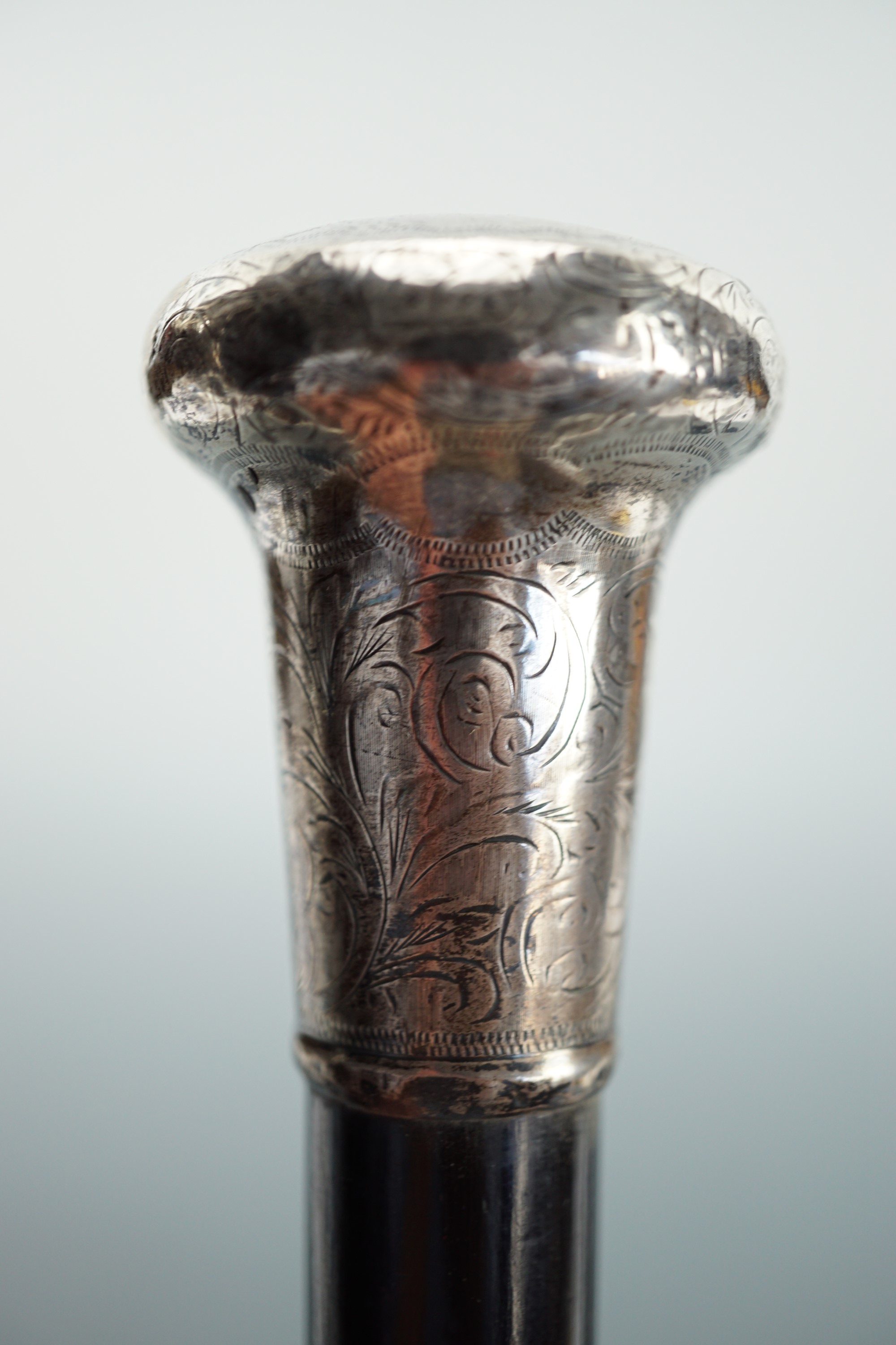 A gentleman's silver mounted ebonized evening cane, the pommel wriggle-work and engraved with - Image 3 of 4