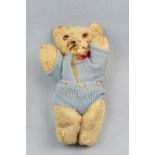 A vintage golden plush wood-wool-filled Teddy bear (a/f)