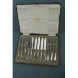 A cased set of George V silver-handled fruit knives and forks, Lee & Wigfull (Henry Wigfull),