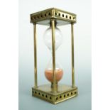 A Victorian brass hourglass, 22.5 cm