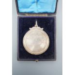 A Victorian Langholm Curling Club silver medallion, the obverse engraved in depiction of the