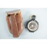 A Verner's patent prismatic marching compass in leather case
