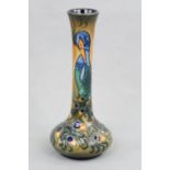 A contemporary Moorcroft slender baluster peacock pattern vase, 20 cm