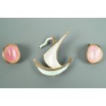 A pair of Norwegian enamelled white metal clip earrings, each of concave oval form, pink basse
