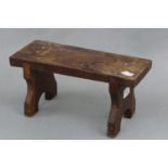 A small wooden stool, 30 x 13 x 15 cm high