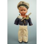 An inter-War German clockwork composition boy sailor, 16 cm