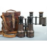 A set of Great War British Mk V special binoculars in 1916 dated leather case, together with a set