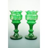 A pair of Victorian emerald green glass lustres, with hand-enamelled and gilt decoration, 37 cm