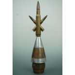 A "trench art" desk ornament fabricated from an artillery shell fuse and cartridges, 28 cm