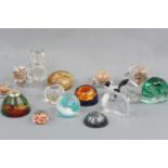 Seven paperweights modelled as animals together with eight other paperweights