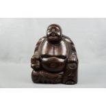 A large wooden seated Buddha, 45 cm high