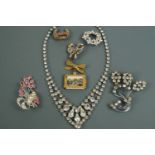 A group of vintage diamante and paste costume jewellery including a 1950s Yorkshire resort