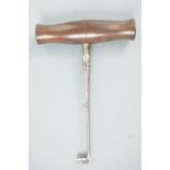 A Victorian Sim and Law patent cork puller in burnished steel and turned rosewood. [See Wallis, "