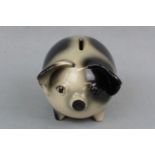 A 1960s kitsch piggy bank, 14 cm high