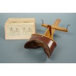 A late 19th Century "Saturn" Holmes-Bates type stereoviewer together with a varied assortment of