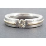 A contemporary diamond solitaire ring, the brilliant-cut diamond of approximately .50ct, held in a