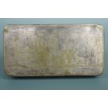 A finely engraved 18th Century Dutch brass tobacco box, the hinged lid bearing a depiction of a