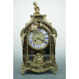 A 19th Century brass Boule mantle clock of 18th Century style, 39 cm high