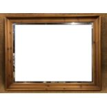 A large contemporary pine mirror, 138 x 108 cm