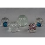Five large controlled bubble glass paperweights