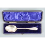 A cased Victorian Scottish silver christening spoon, the stem and terminal decoratively engraved
