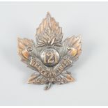 A Great War Canadian 121st Battalion, (Western Irish) cap badge, maker-marked O B Allan