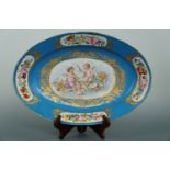 A 19th Century Sevres porcelain oval service dish, decorated in depiction of cupids with musical