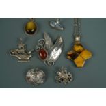 Silver and white metal jewellery including a large Polish cruciform amber pendant and cabochon