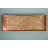 A Keswick School of Industrial Art long copper tray, its gallery pierced in a series of circles,