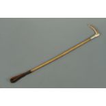 An Edwardian silver-collared and antler-handled riding crop