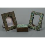 Two Victorian Anglo-Indian turquoise-inset photograph frames together with a similar snuff box,